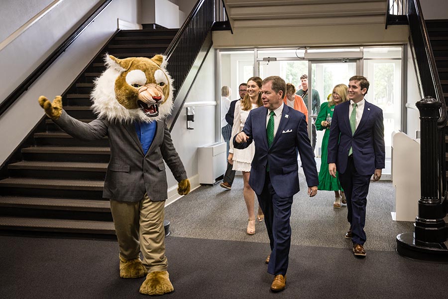 Bobby Bearcat escorted the Tatum family into the Administration Building as Dr. Lance Tatum began his first day as Northwest's president. (Photo by Lauren Adams/Northwest Missouri State University)