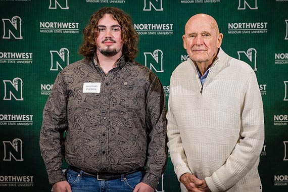 Jeremiah Dobbins (left) is pictured with Jim Skelton, son of Luther Skelton, at Northwest's Powering Dreams celebration of donors and scholars in September. (Northwest Missouri State University photo)