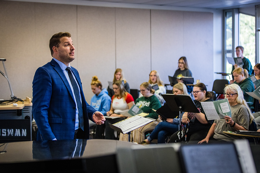 Dr. Adam Zrust conducts Northwest vocal ensembles and serves as an assistant professor of music. (Photo by Lauren Adams/Northwest Missouri State University)