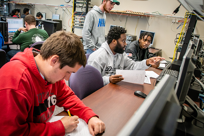 Northwest students participate in a computer networking fundamentals course last fall. The University's reputation for student success recently earned it an invitation to assist AASCU with its launch of a Center for Student Success. (Photo by Todd Weddle/Northwest Missouri State University)