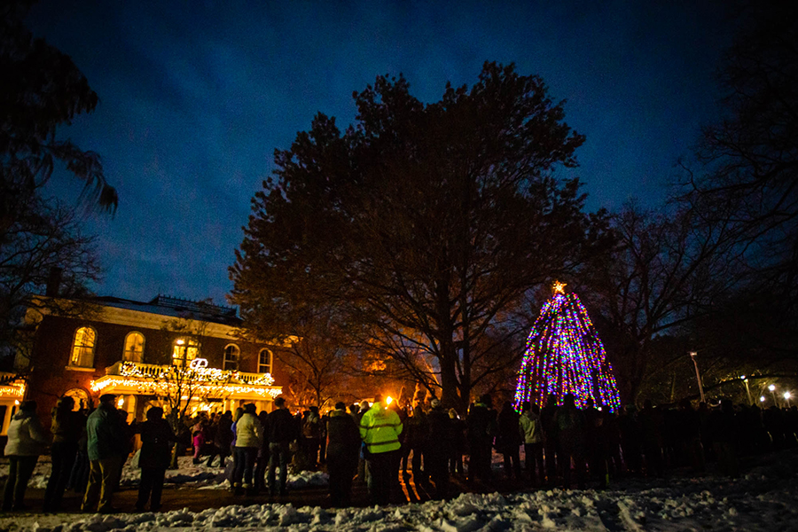 The Northwest community gathered last year for the annual Holiday Tree Lighting ceremony outside the Thomas Gaunt House. The University hosts this year's event Dec. 3 at the Memorial Bell Tower. (Photo by Carly Hostetter/Northwest Missouri State University)