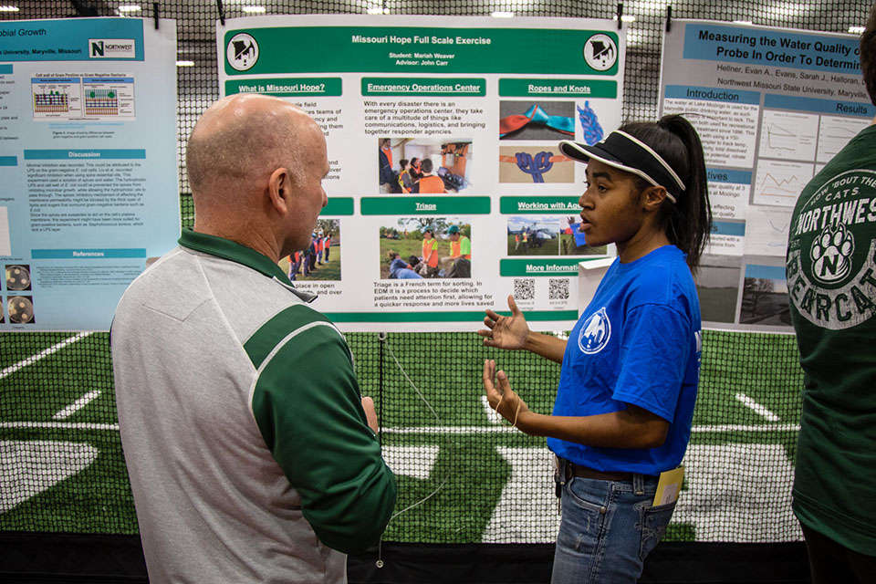 Mariah Weaver, an emergency and disaster management major, presented a poster about her experience participating in the Northwest's annual Missouri Hope disaster simulation.  (Photo by Brandon Bland/Northwest Missouri State University)