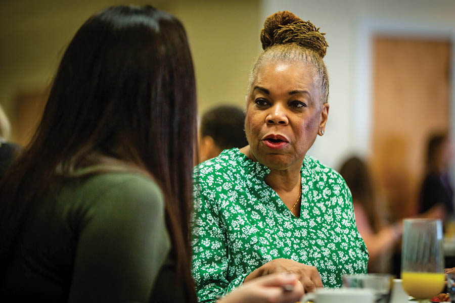 Anne-Marie Clarke converses with a guest at Northwest’s annual Martin Luther King Day Peace Brunch last January. Clarke retired last year after a 33-year career with the 22nd Judicial Circuit Court of St. Louis. (Photo by Todd Weddle/Northwest Missouri State University)