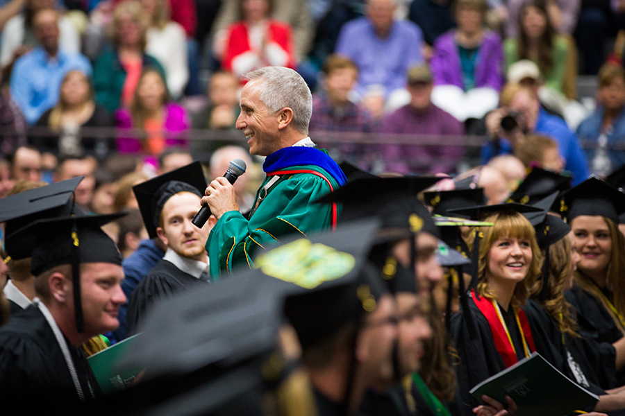 President Jasinski often stepped off the stage during Northwest commencement ceremonies to ask questions of graduating students and invite them to share stories about their experiences at the University.