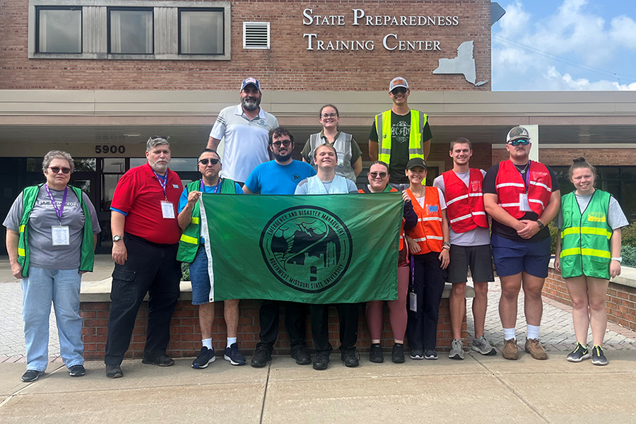 Pictured left to right while attending New York Hope in August are, in the front row, Dr. Lauren Leach-Steffens, Dr. Mark Corson, Richard Leach-Steffens, Tim Davis, Will Thornsberry, Cheyenne Martin, Kaelyn Simnitt, Will Roberts, Ewan Mills and Kelsie Krier. In the back row are Travis Surprise, Mackenzie Baker and Michael Meyers. (Submitted photo)