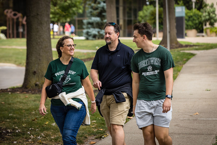 A family walks the Northwest campus during the University's 2023 Family Weekend. (Photo by Lauren Adams/Northwest Missouri State University)