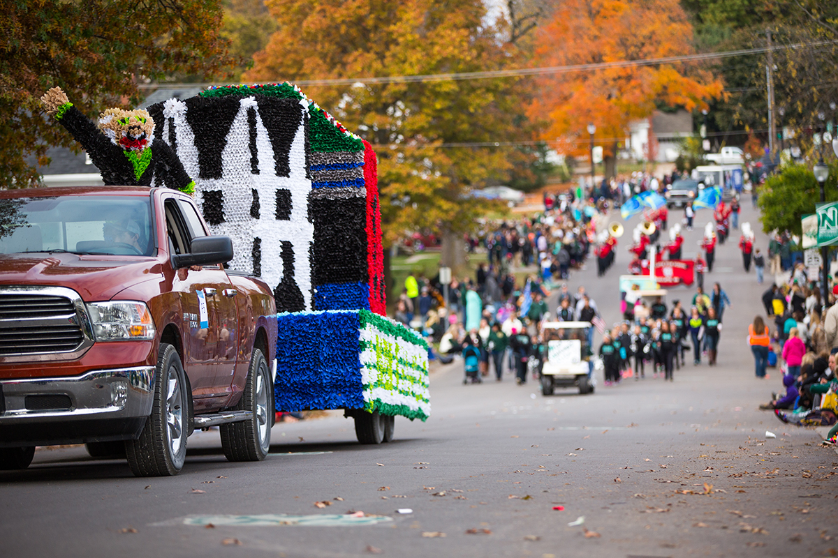 The Homecoming parade, pictured in 2015, features more than 100 entries, including marching bands and floats sponsored by campus and community organizations and businesses. (Northwest Missouri State University photo)