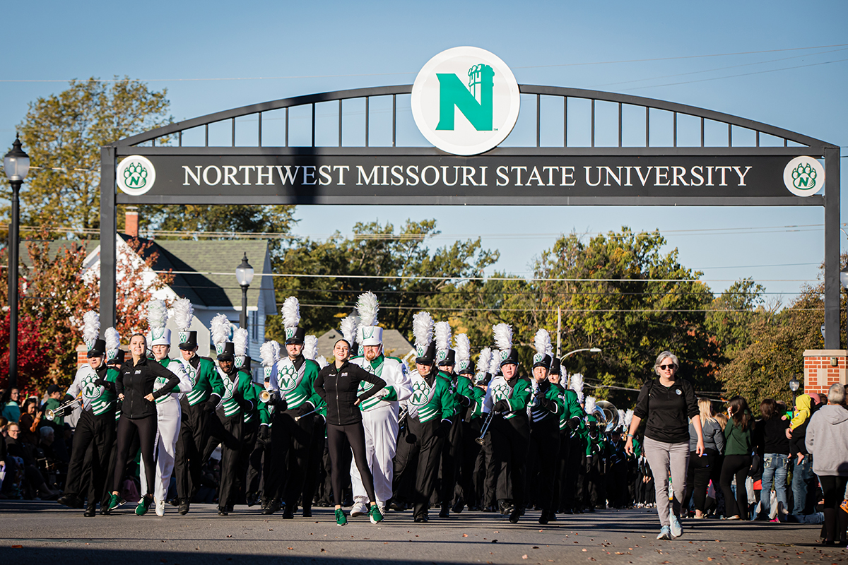 The Homecoming parade on Fourth Street features the Bearcat Marching Band. (Northwest Missouri State University photo)