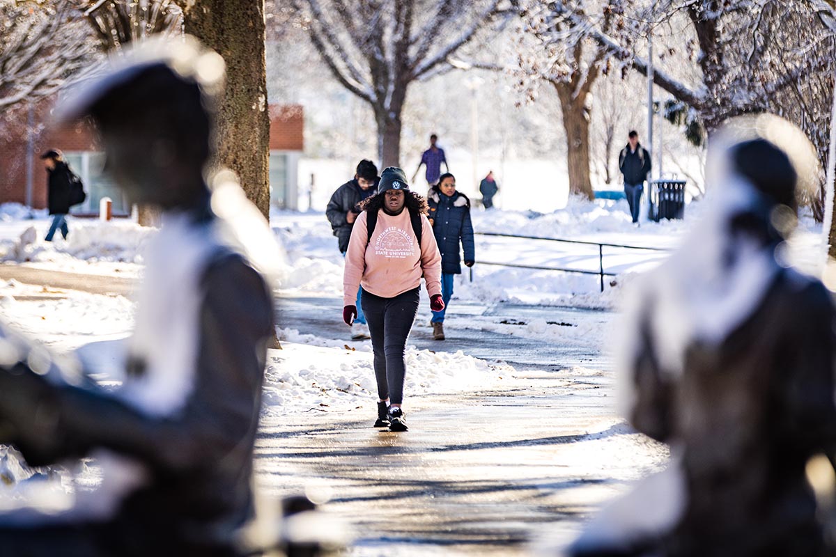 Northwest students navigate the campus  after a January snowfall. The University and public safety agencies are reminding people to be prepared for winter weather during Missouri Winter Weather Awareness Week Nov. 4-8. (Photo by Lauren Adams/Northwest Missouri State University)