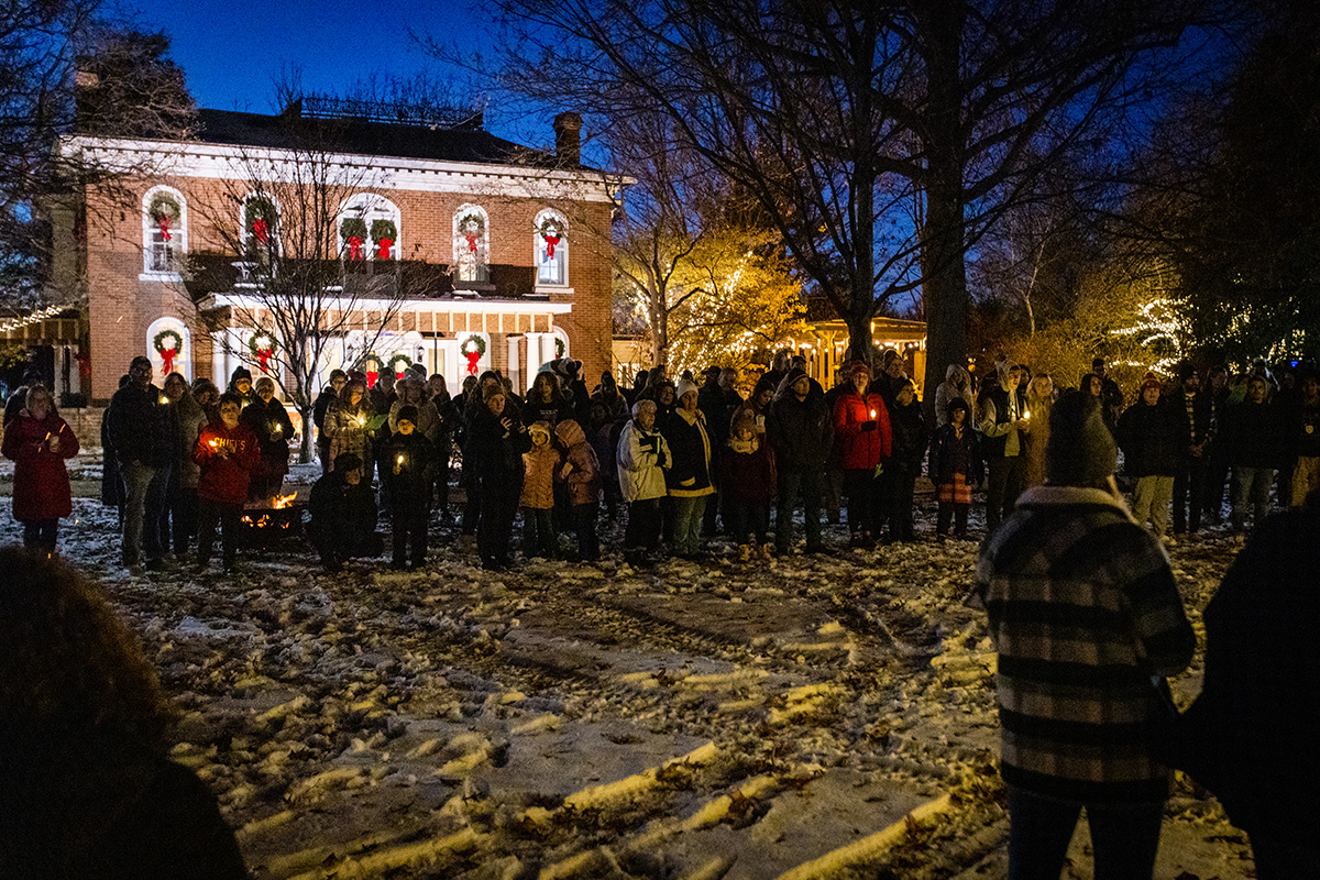 Northwest community members annually gather at the Thomas Gaunt House for the President’s Tree Lighting to usher in the holiday season on the campus. (Photo by Lauren Adams/Northwest Missouri State University)