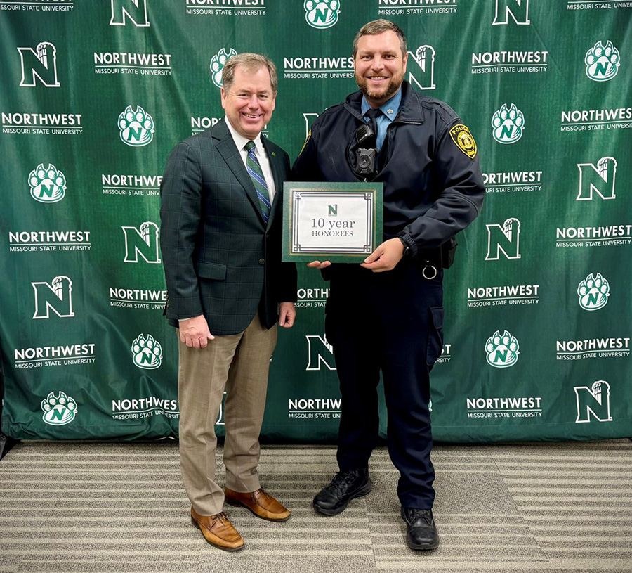 Pictured with Northwest President Dr. Lance Tatum is Kyle Hoyt, an A-shift sergeant in the University Police Department.