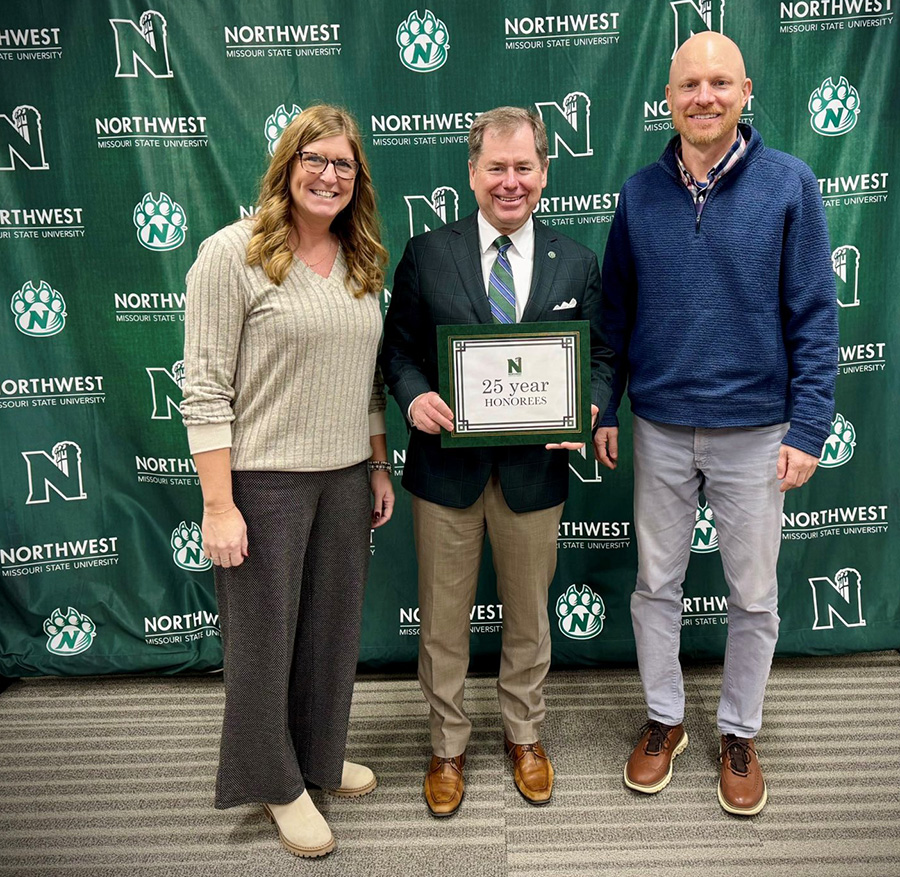 Pictured left to right with Michelle Drake and Dr. Lance Tatum is Jeremy Waldeier, director of admissions for recruitment in the Office of Admissions.