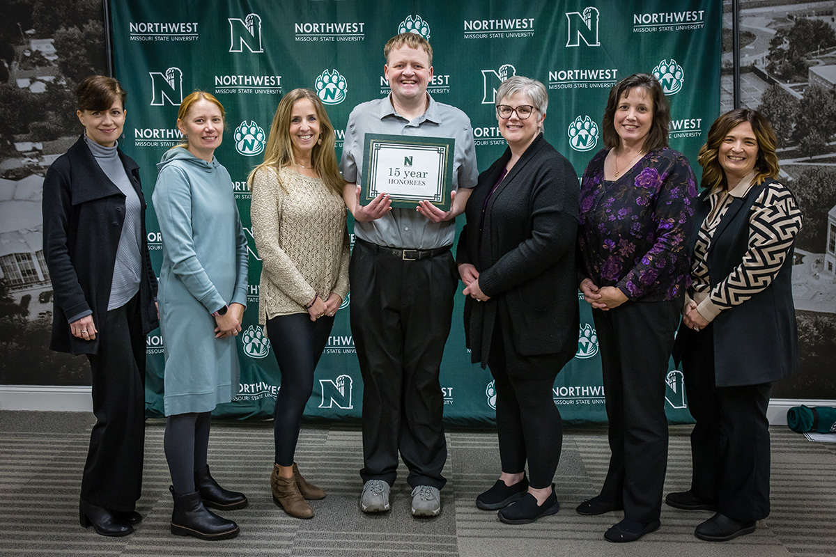 Pictured left to right are Dr. lldi Olasz, associate professor of English, Department of Language, Literature and Writing; Kori Binette, senior instructor of English, Department of Language, Literature and Writing; Nikki Hackett, office manager, Department of Fine and Performing Arts; Dr. Ben Blackford, director and professor of management, Melvin D. and Valorie G. Booth College of Business; Heather Kline, assistant registrar, Registrar Office; Diane Hargrave, executive secretary, Office of the Provost; and Dr. Jennee Gregory, director, Regional Professional Development Center.